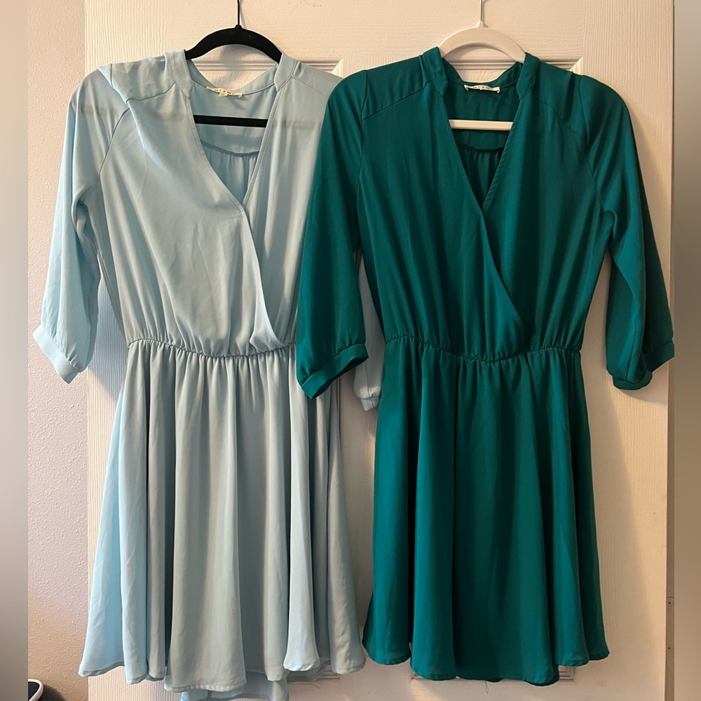 Price for both dresses! Francesca’s Mini Dresses in Light Blue and Green